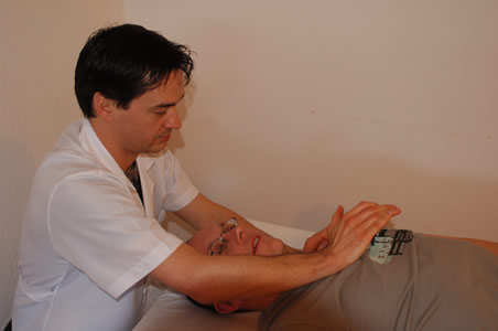 Marcos performing a polarity therapy as part of a client treatment</perch:content>