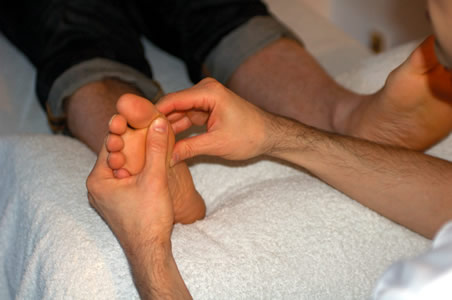 Marcos performing Reflexology
